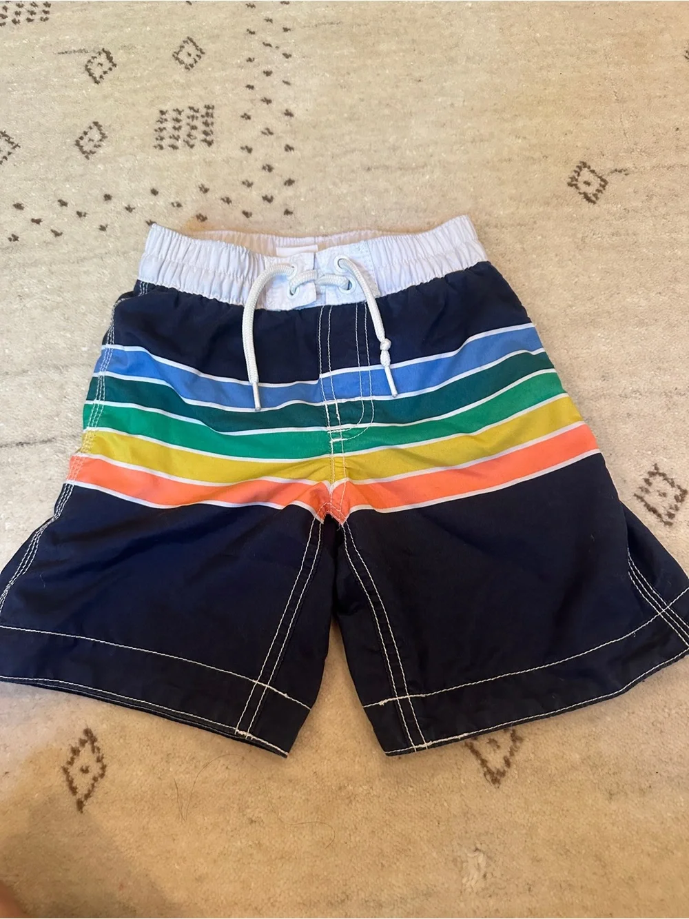 GAP Boys Navy Swim Trunks with Rainbow Stripes